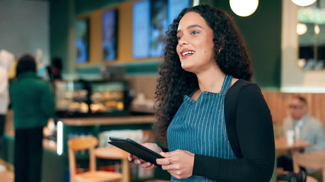 Cafe woman and business owner on tablet