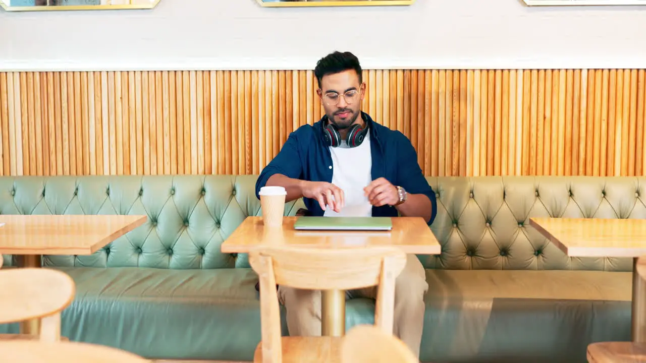 Laptop cafe restaurant and man typing