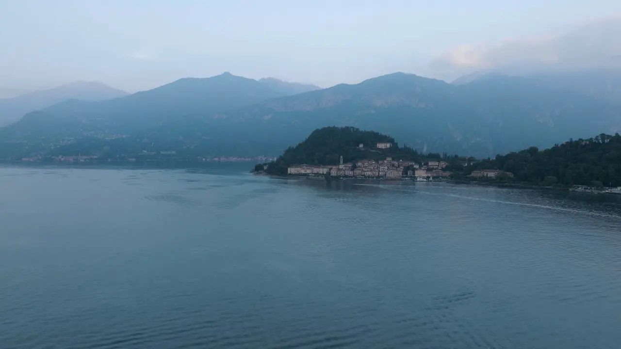 4K Aerial Wide evening dusk shot of Bellagio Lake Como Italy