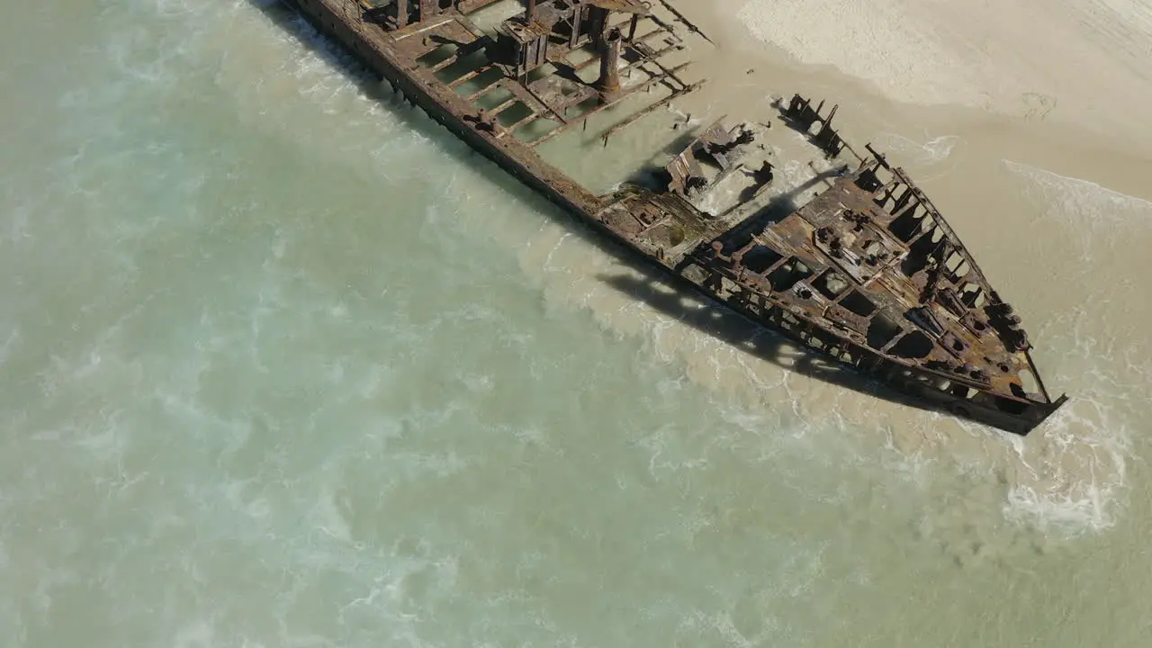 Drone shot of the abandoned SS Maheno shipwreck washed up on the coastline of Fraser Island in Australia