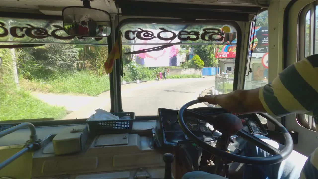 Point of View Shot of Man Driving bus Through Rural Roads in Sri Lanka