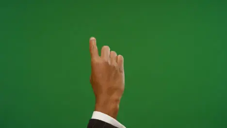 Male Finger making tap gestures on green screen