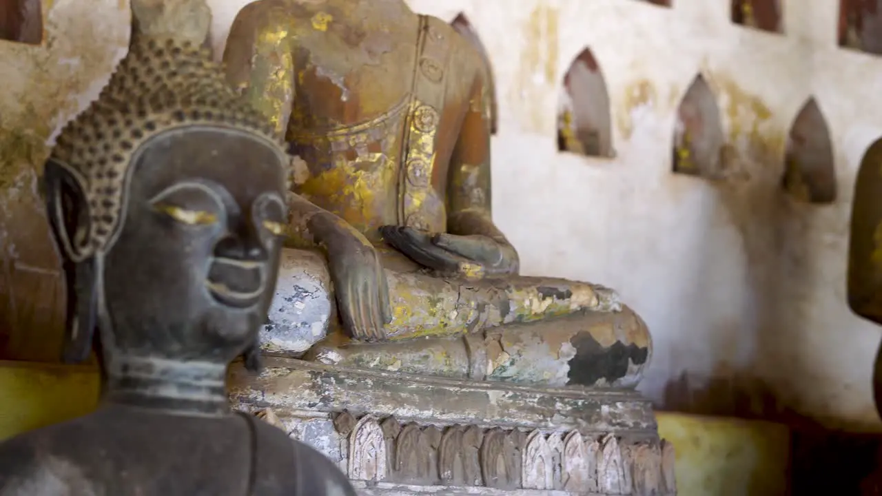 Close Up View Of Bronze Buddha Statue At Wat Si Saket In Vientianne Laos