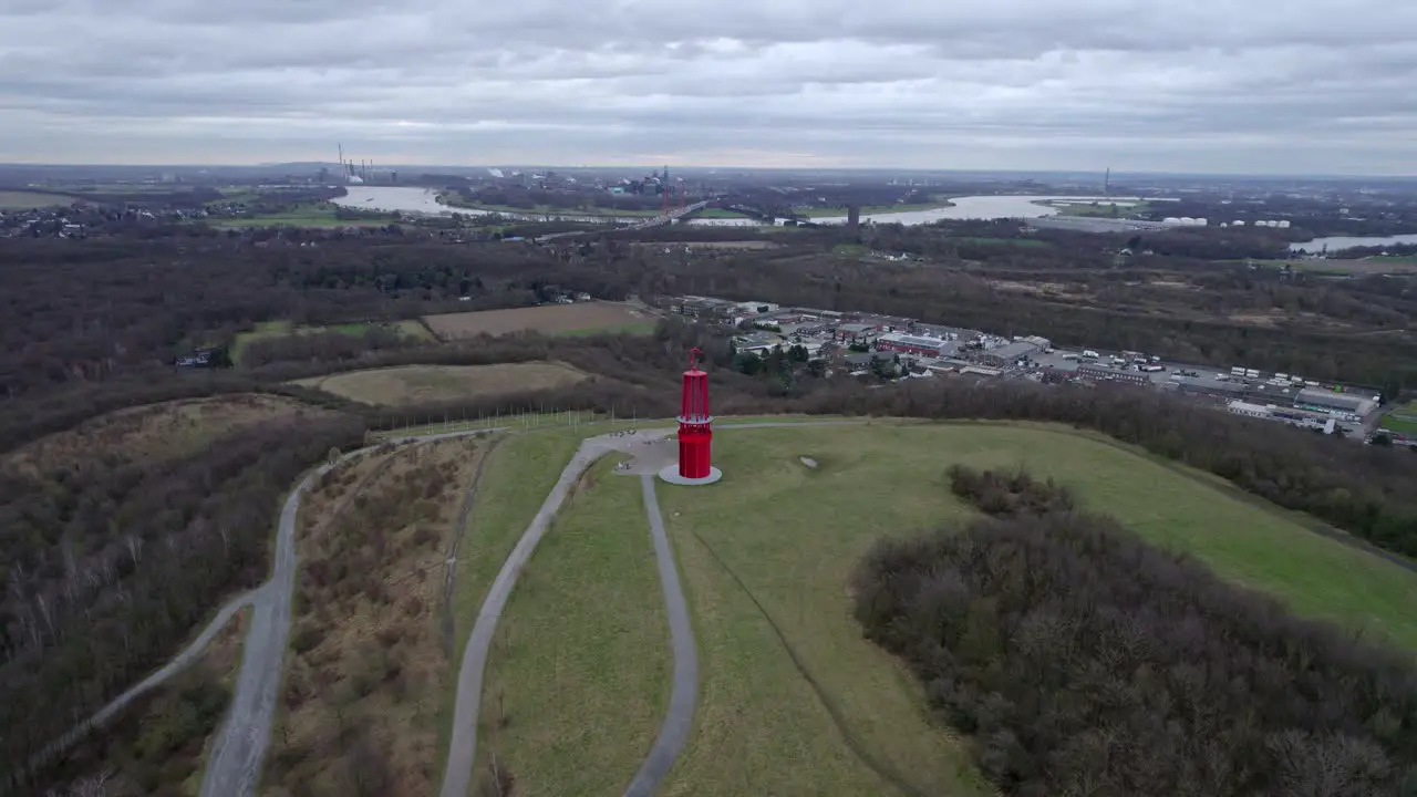 Halde Rheinpreussen Mining Lamp drone orbit with Rhine river in background overcast weather