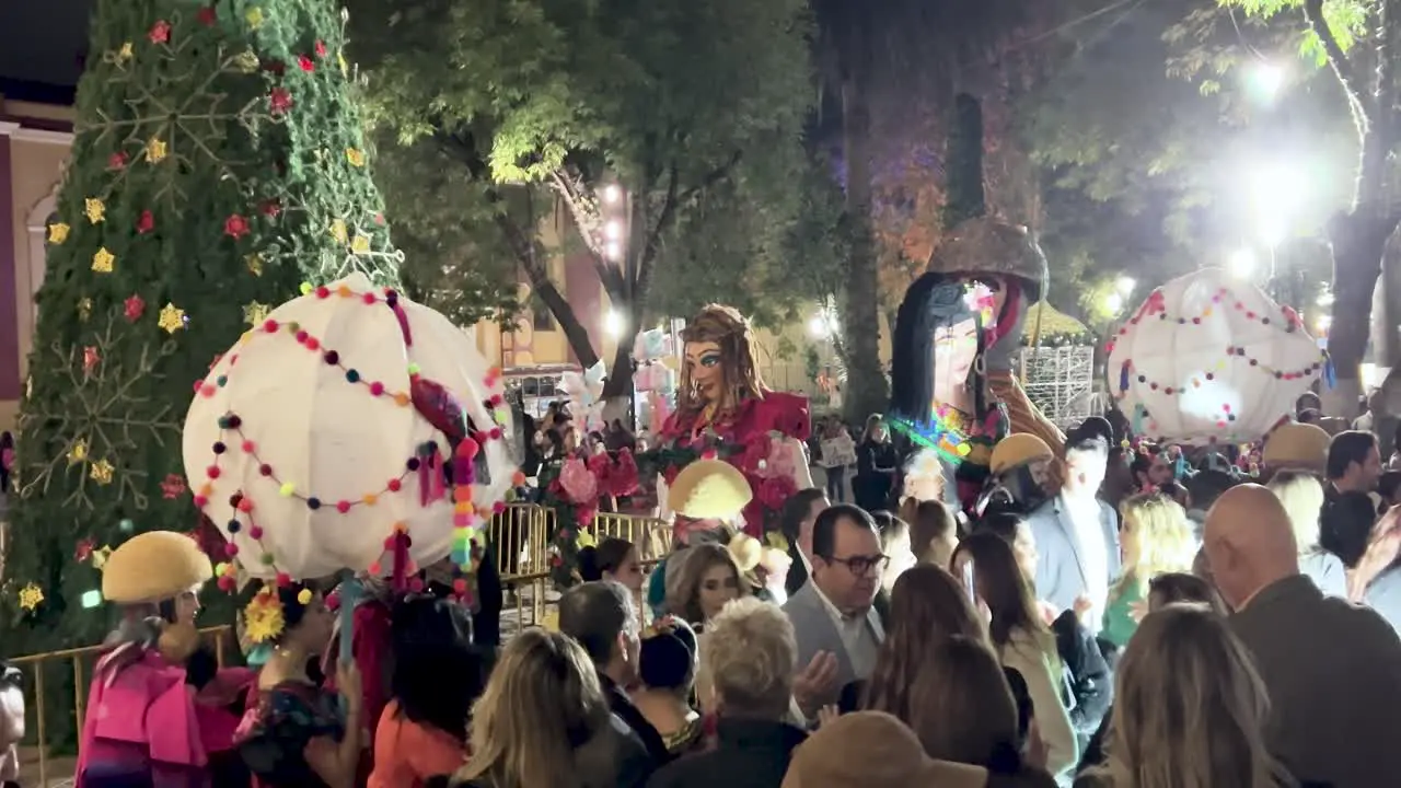 shot of wedding and guests celebrating in san cristobal de las casas main plaza mexico