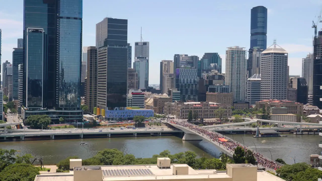 Protesters march through Brisbane on Australia Day