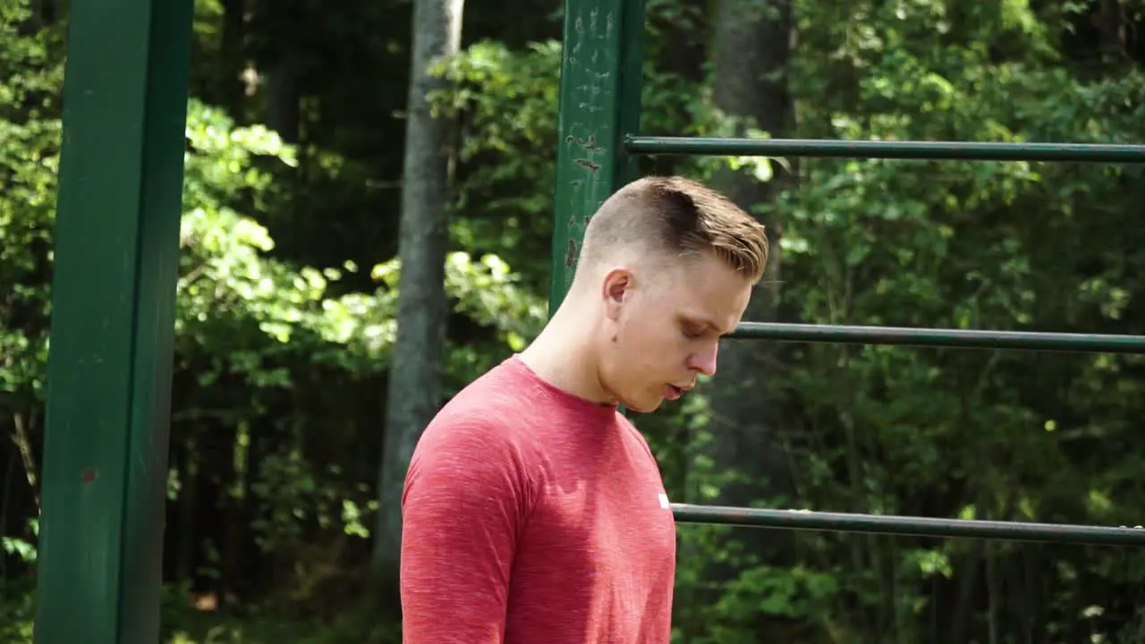 Side shot of young European male breathing and looking deep to get ready to challenges close up