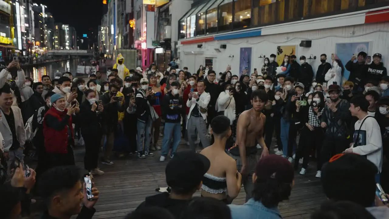 Drunken Japanese People Fighting on Streets on Halloween in Costumes