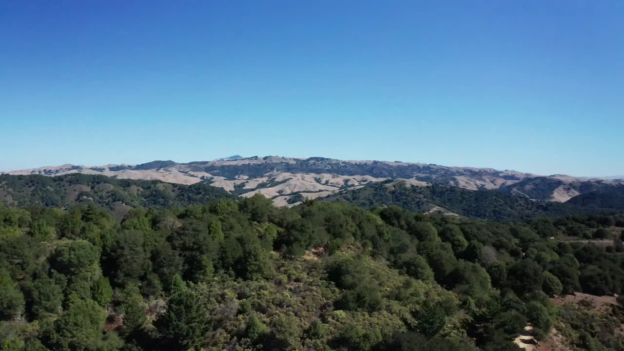 Pan across the foothills and valley below