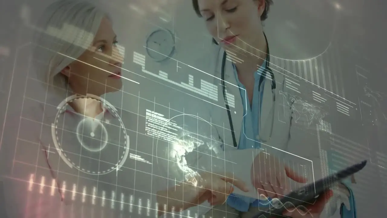 Animation of data on digital screen over caucasian female doctors