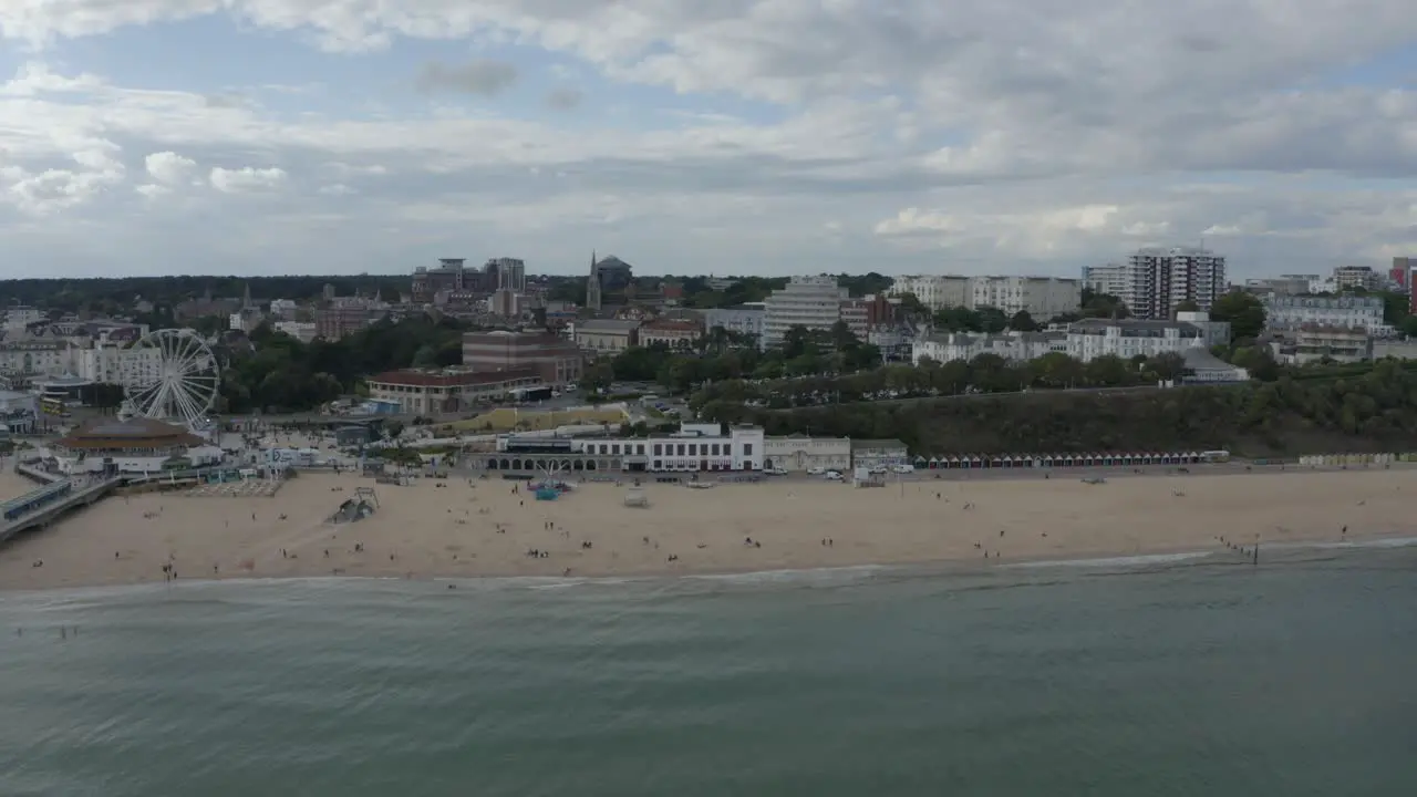 Slider drone shot along bournemouth sea-face