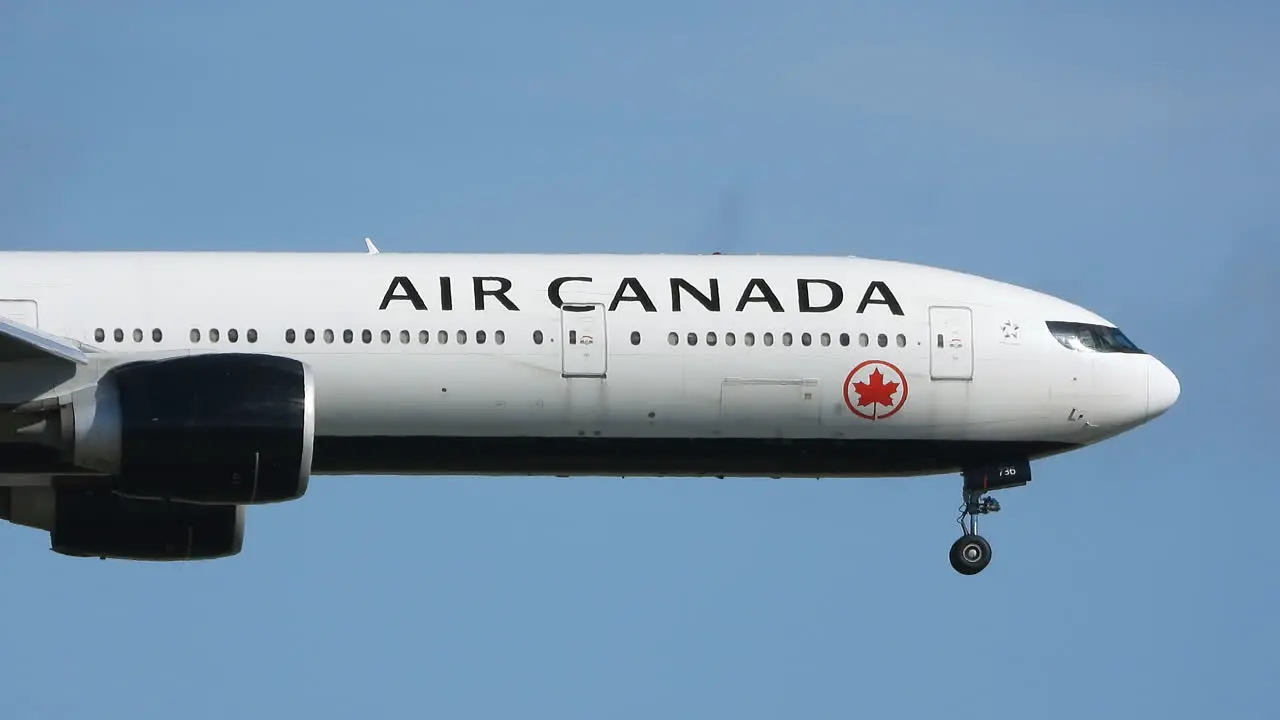 Air Canada Boeing B777 Airplane Aproaching Toronto Internation Airport Follow Close up Shot