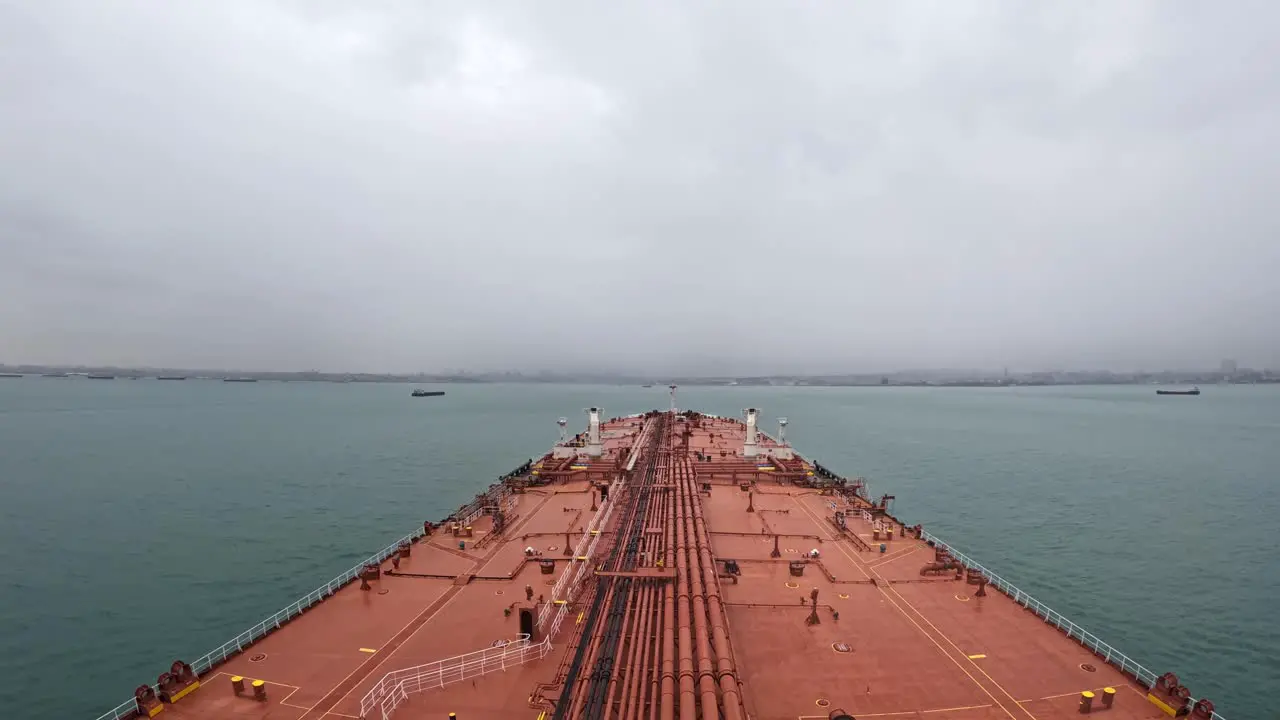 Timelapse oil tanker bow crossing Bosporus strait west entrance cloudy turkey