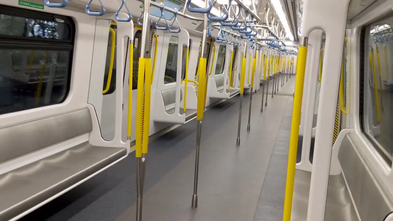 Empty Hong Kong MTR train interior during COVID 19 coronavirus pandemic