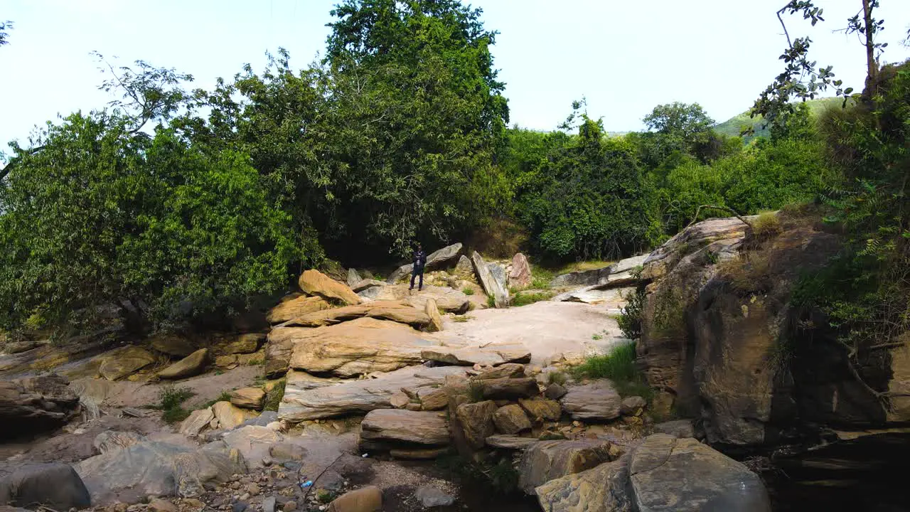 Africa black man flying drone in Kenya