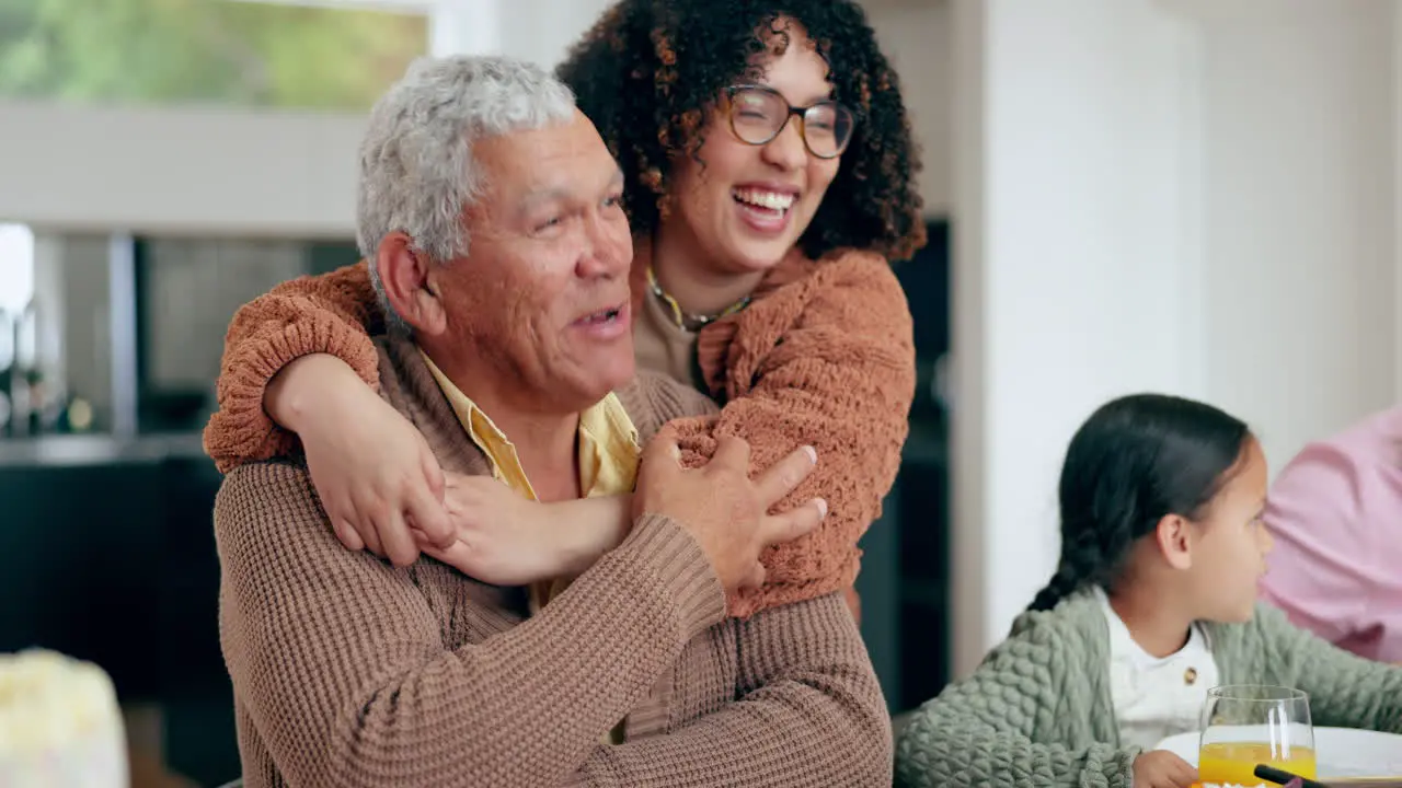 Woman hug senior dad and dinner table in family