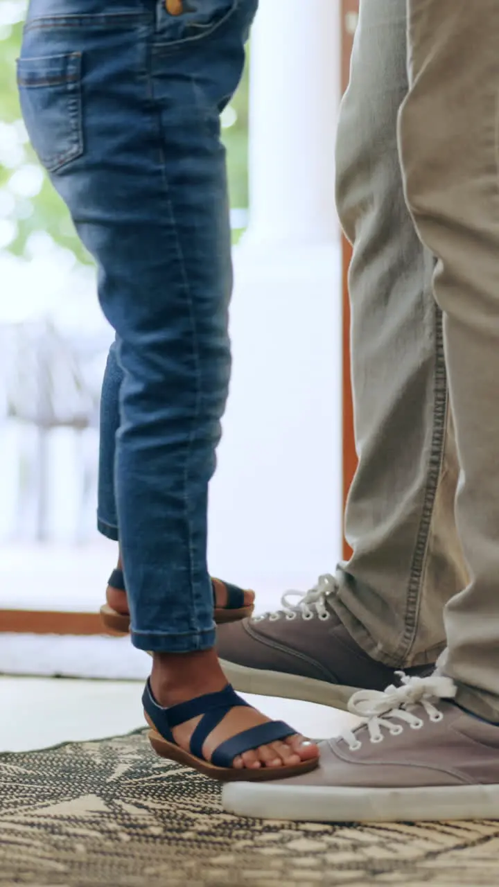 Feet dance and closeup of child with father