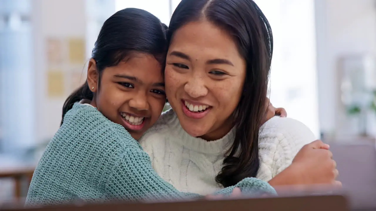 Video call love and mom hugging her child