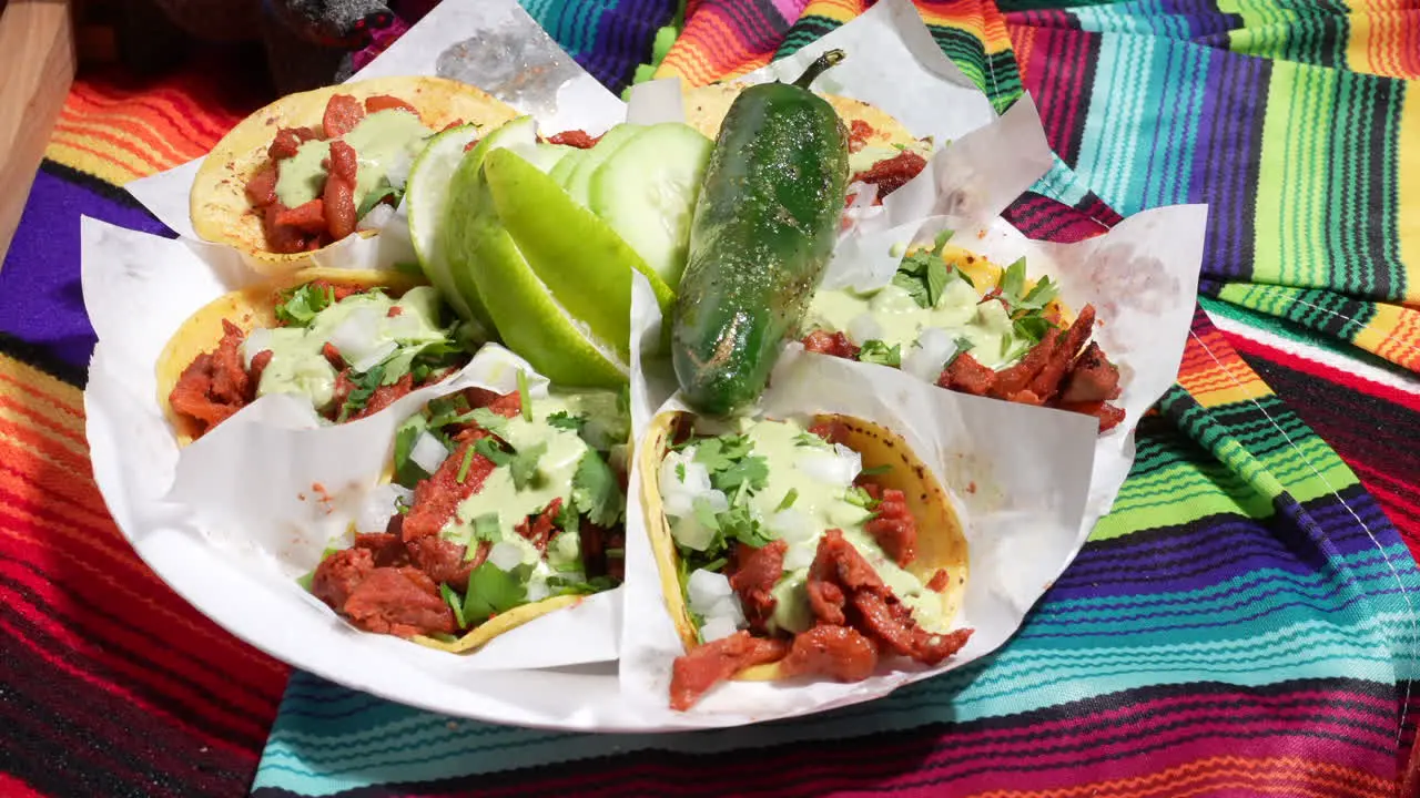 Plate of pulled pork street tacos lime chili pepper food truck series