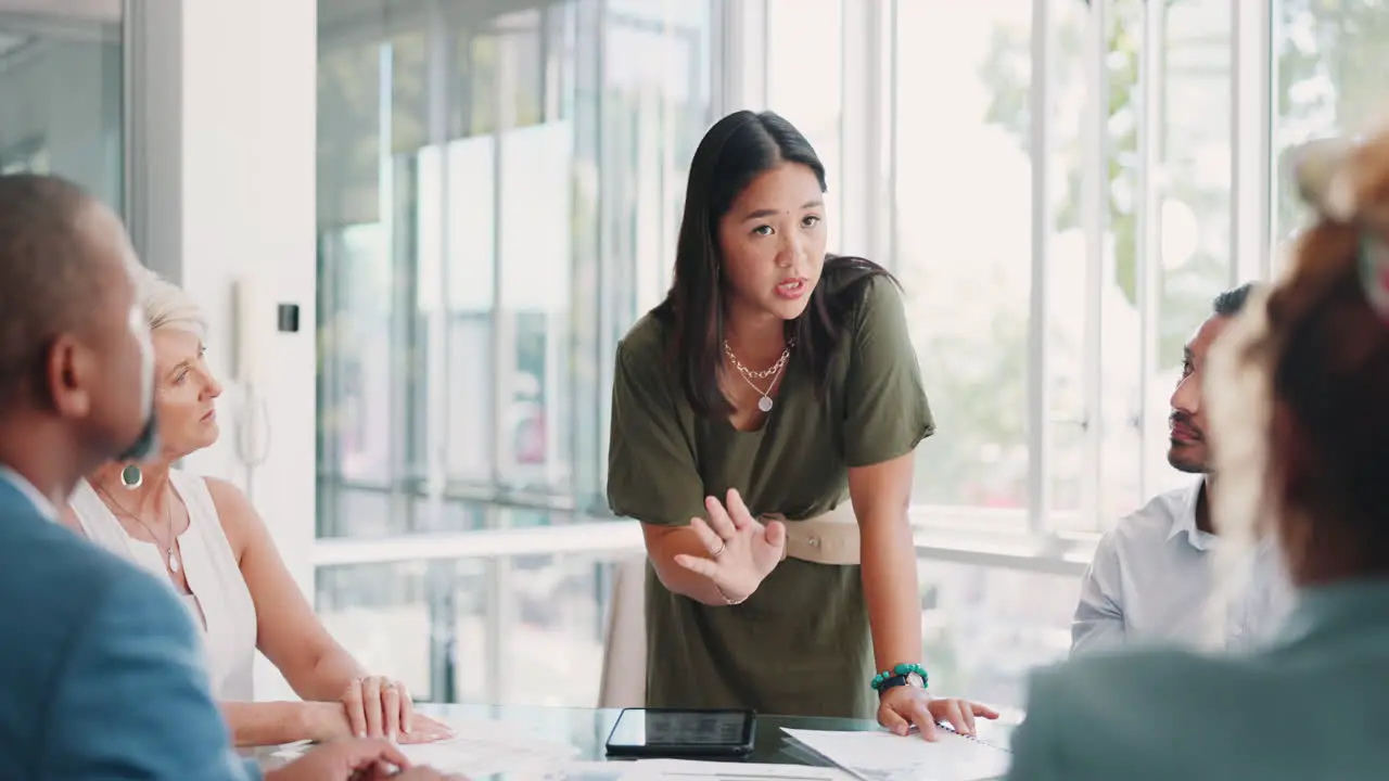 Woman leader and presenter in meeting