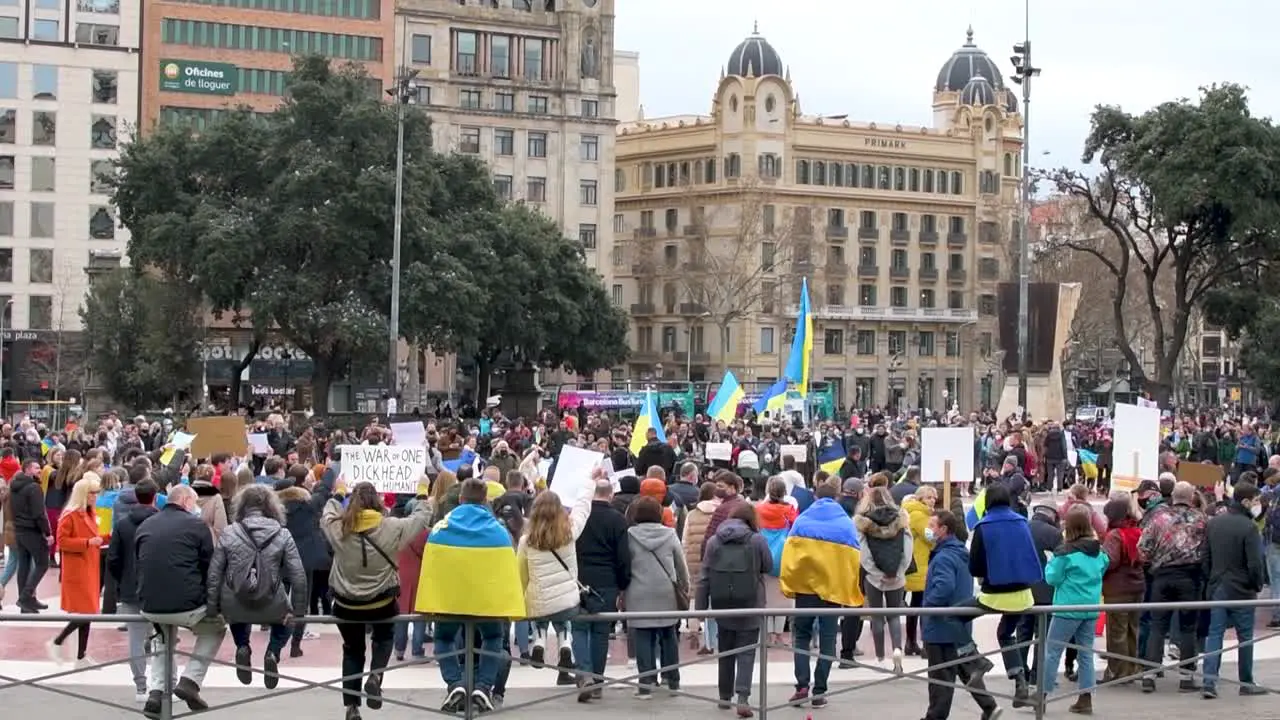 Group of Ukrainians protesting against the war started by Russia in Barcelona