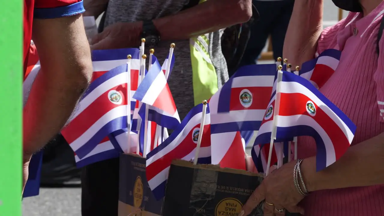 Woman Selling Miniature Costa Rican Flags During Costa Rican Independence Day Parade