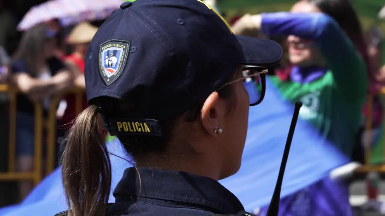 Female Police Officer Watching Over Costa Rica Independence Day Parade