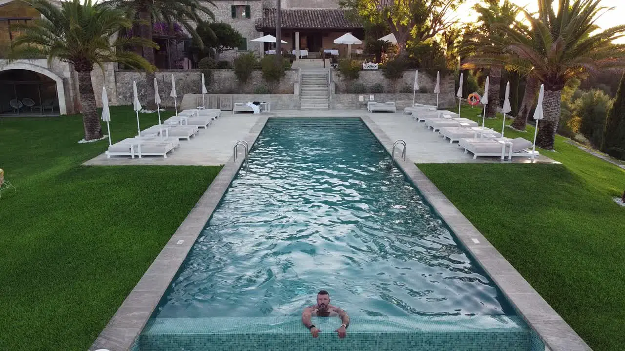 resting on the edge of an infinity pool