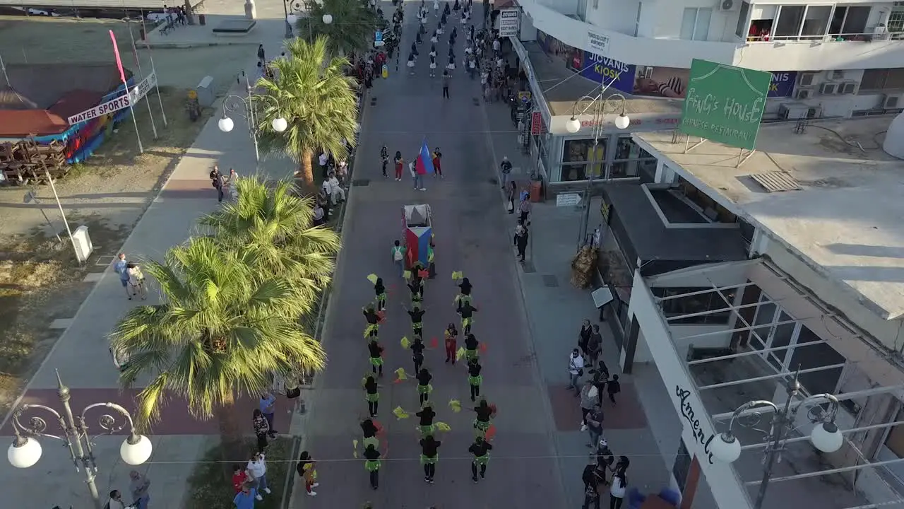 Overtake Shot Of Crowded street With People Celebrating Larnaca Yearly Parade