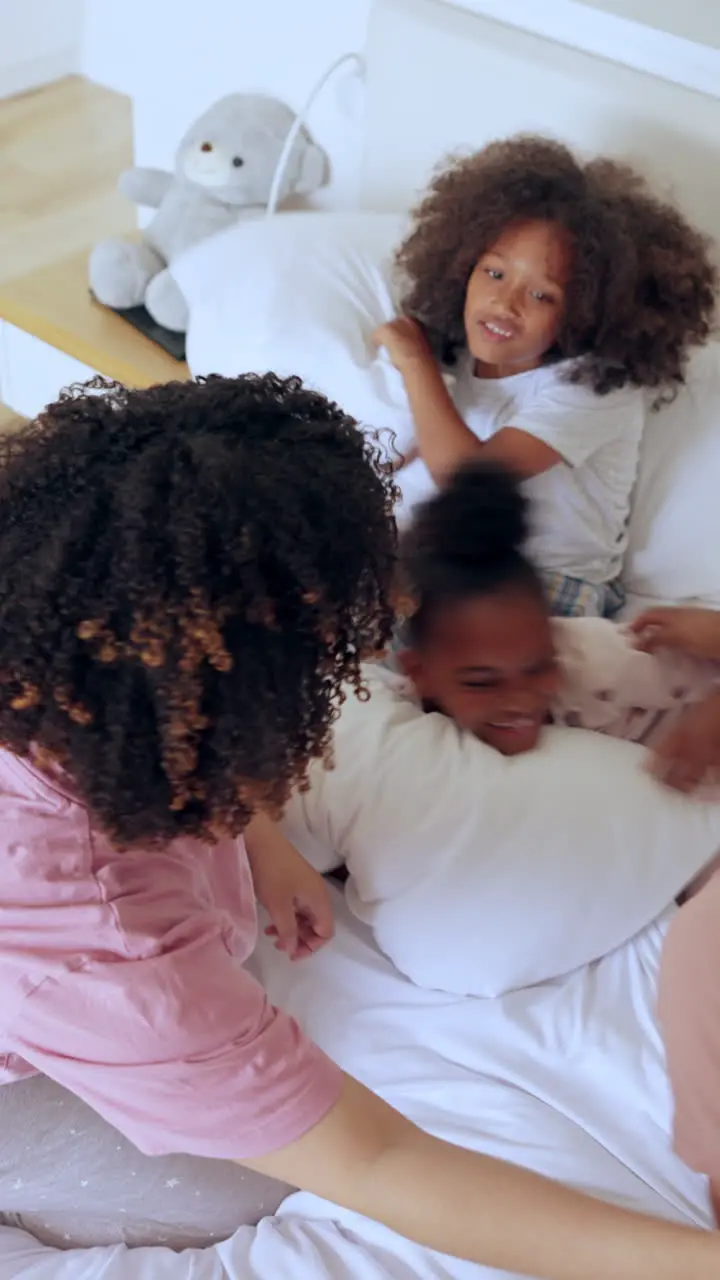 Happy family bed and pillow fight