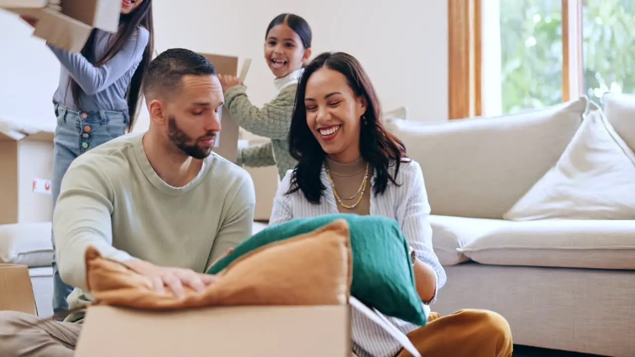 New home foam peanuts and happy family with box