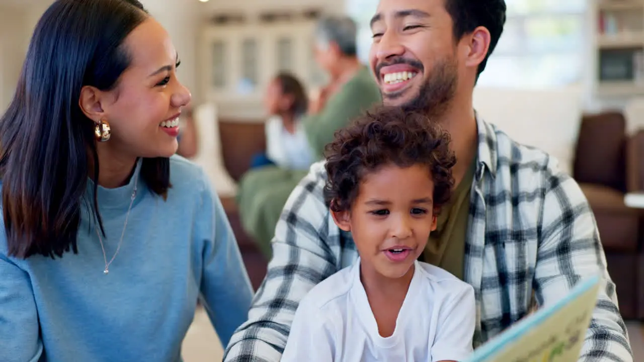 Happy parents child and reading book in family