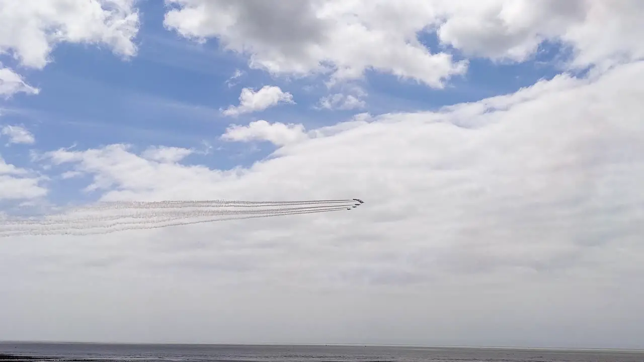 Red Arrows Planes Flying in Formation Trailing Smoke During Air Show in Swansea Bay