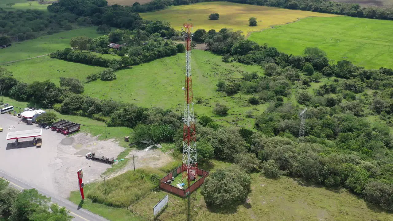 aerial shot with drone making a point of interest over a mobile phone antenna