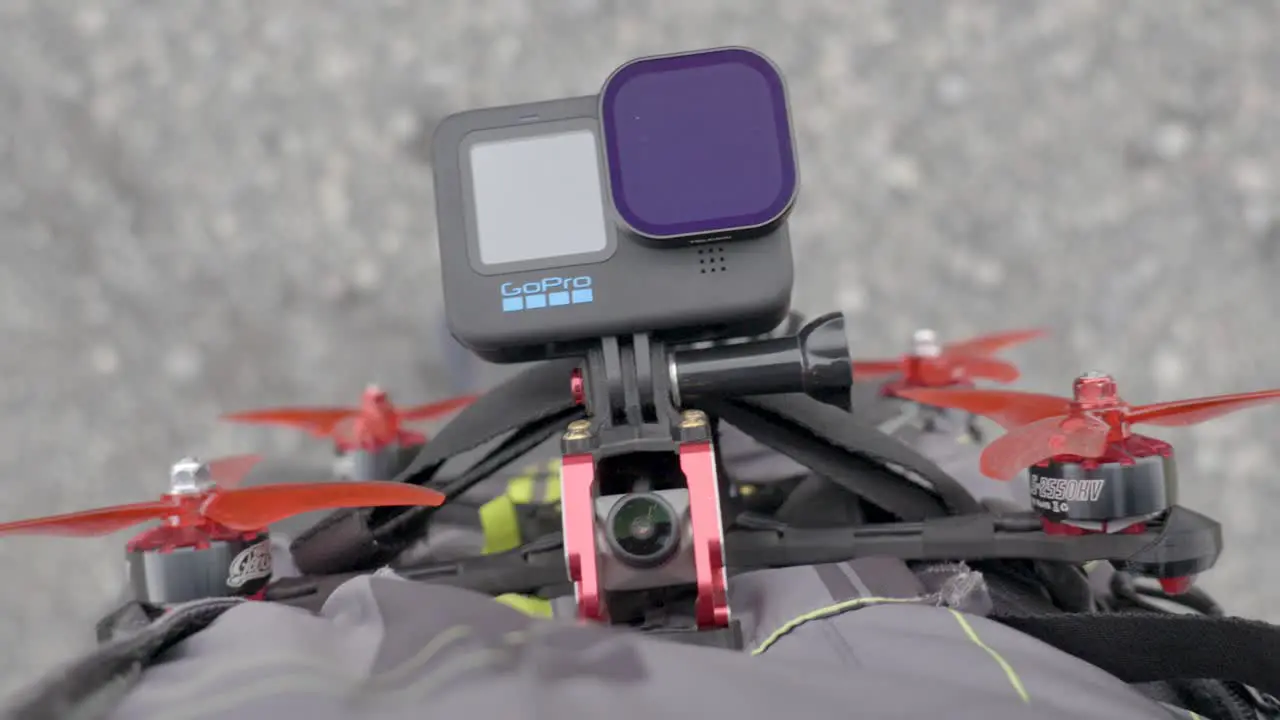 Action camera mounted on drone fit on vlogger's waist