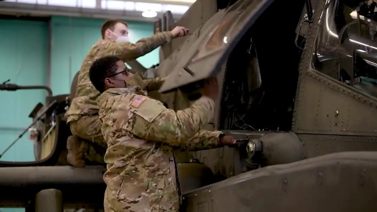 Ground Mechanics Electrician Crews Maintain 12Th Combat Aviation Brigade Ah-64 Apache Helicopters Germany