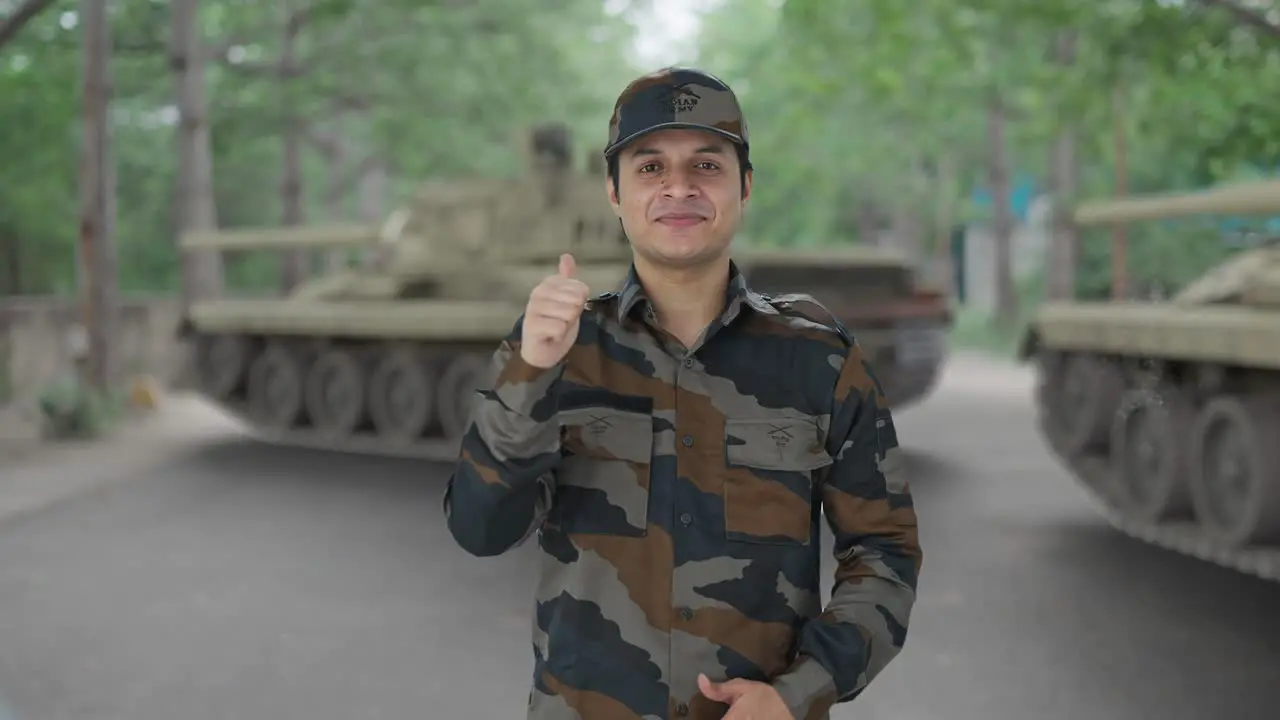 Happy Indian army man showing thumbs up