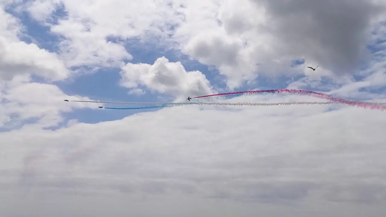 Red Arrows Rolling Around Central Plane During Air Show in Swansea