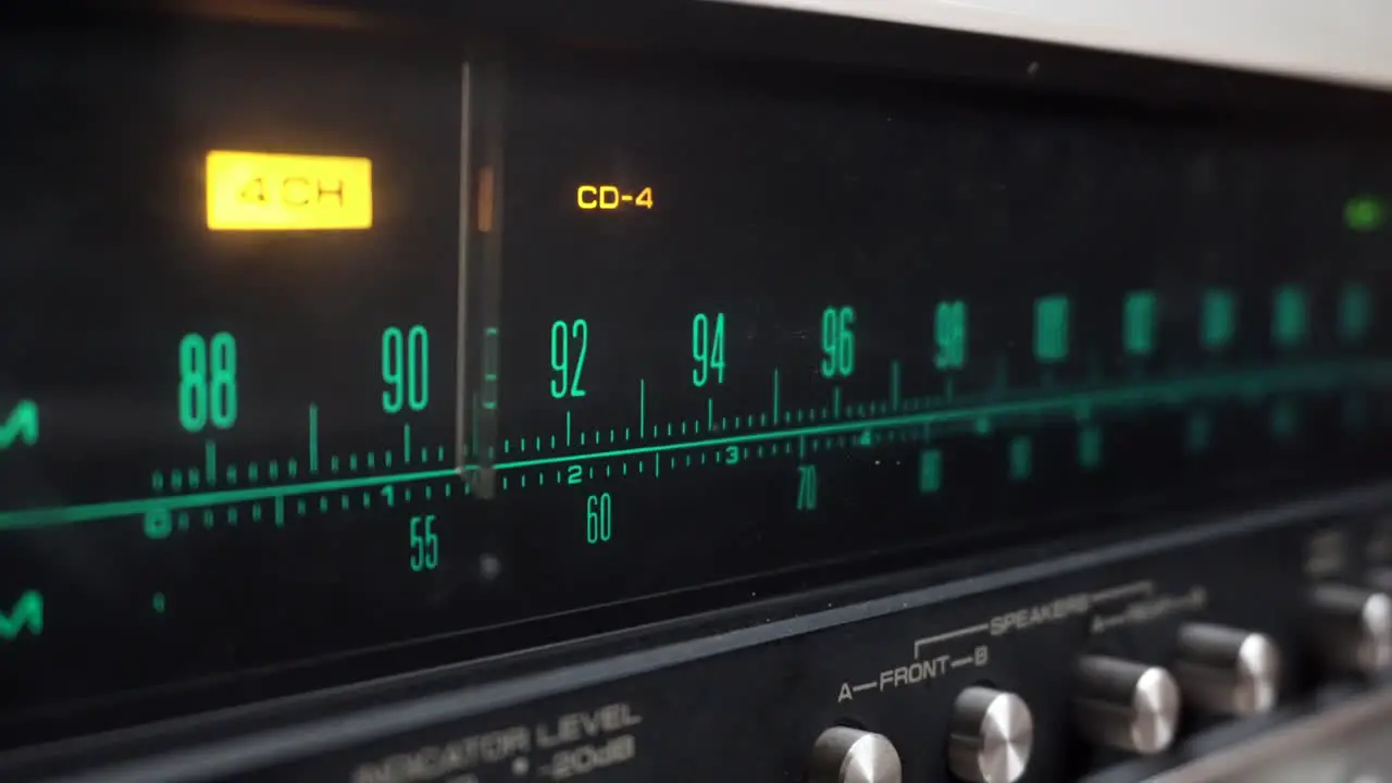 Tuning in an old and retro amplifier with green FM numbers