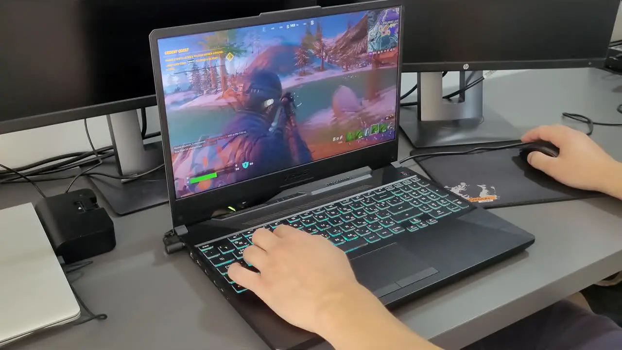 Playing and dying in Fortnite on a gaming laptop