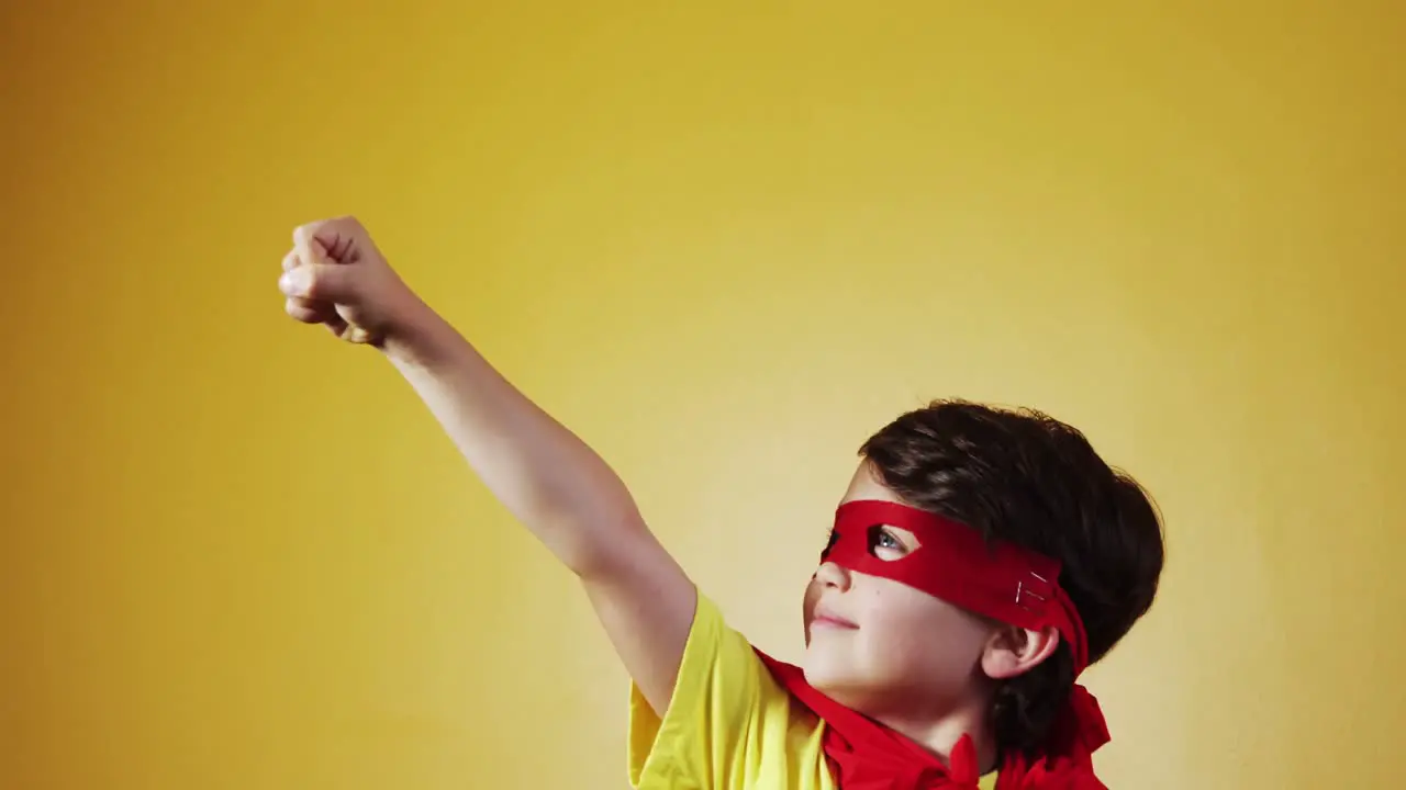 Boy pretending to be a superhero