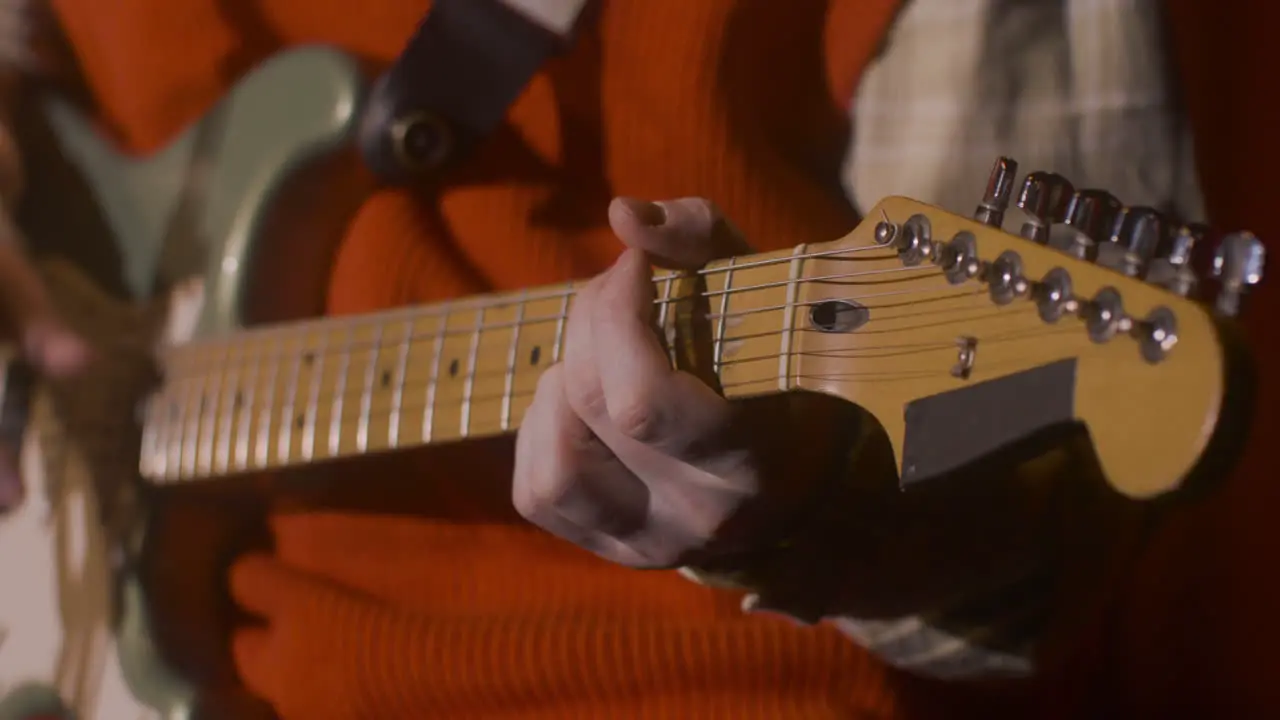 Close Up Of An Unrecognizable Male Musician Playing Guitar