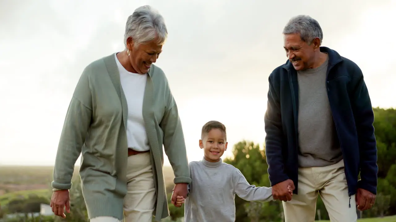 Grandparents walking and holding hands