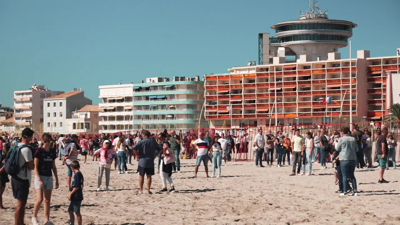 Spectators crowd Palavas Les Flots beach as part of the citys autumn fair Herault France