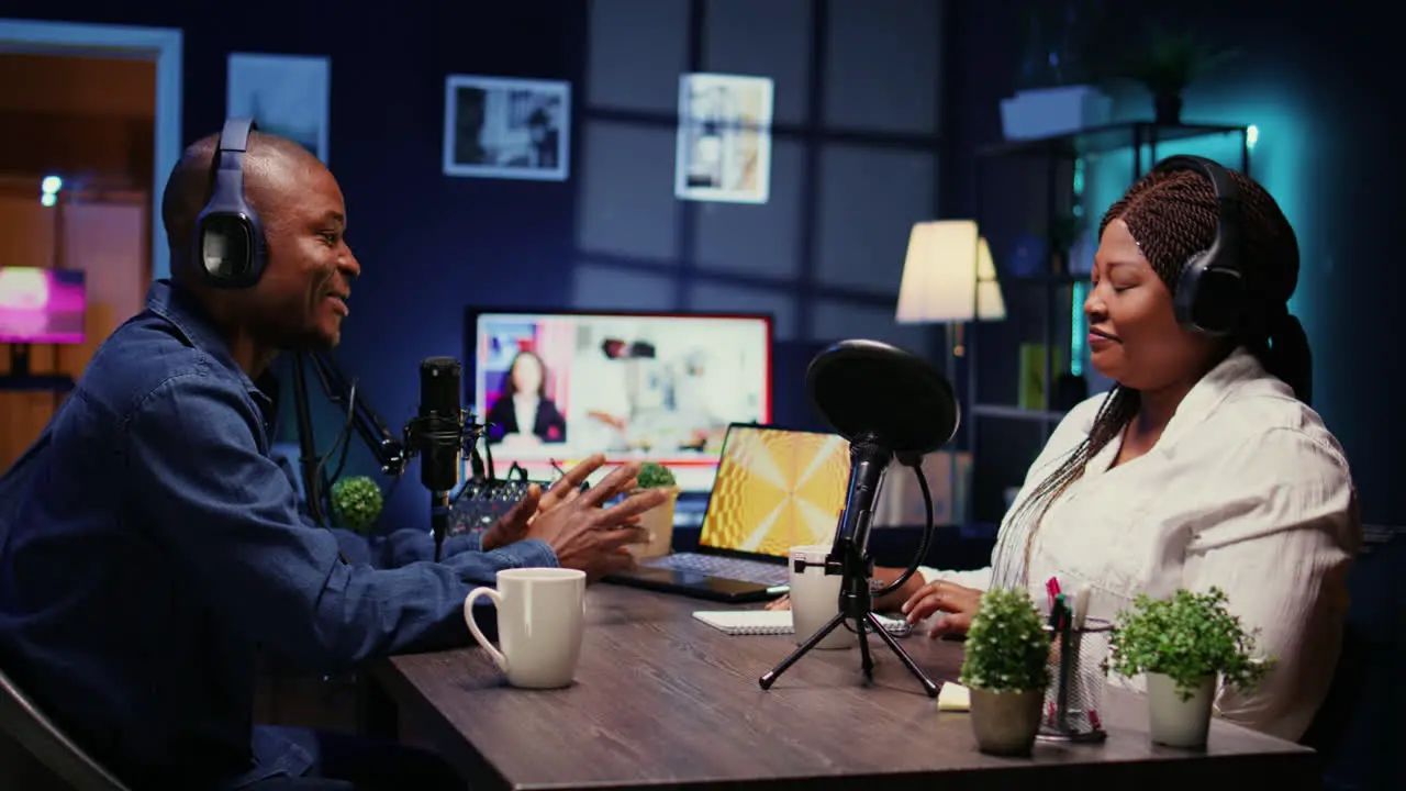 Content creator enjoying nice conversation with guest during podcast