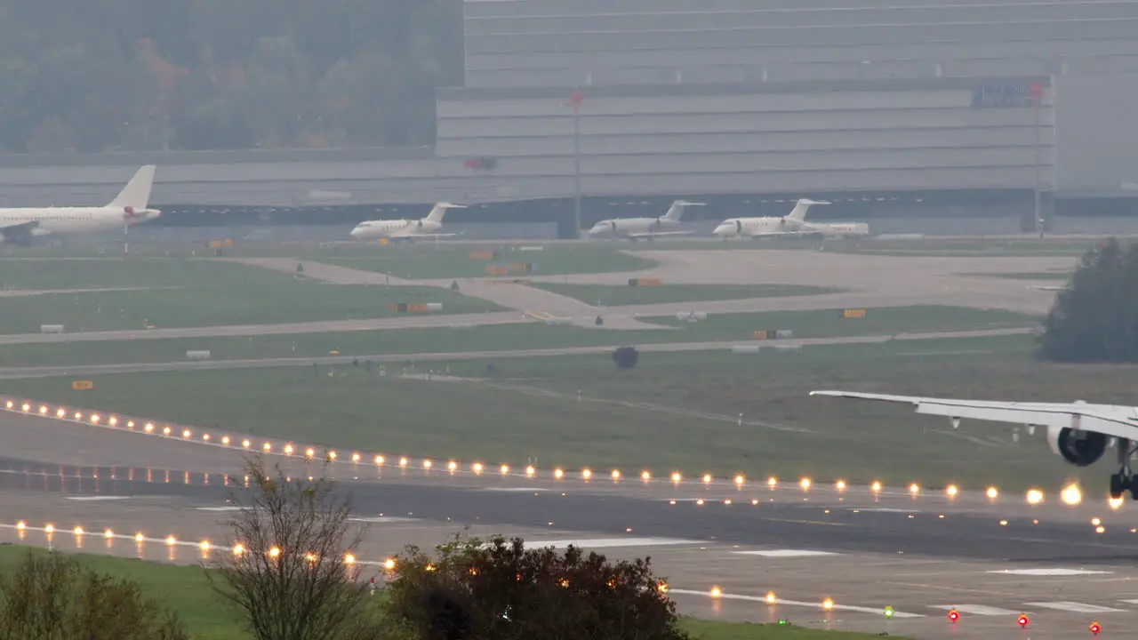 Slow motion airplane arrives to the airport