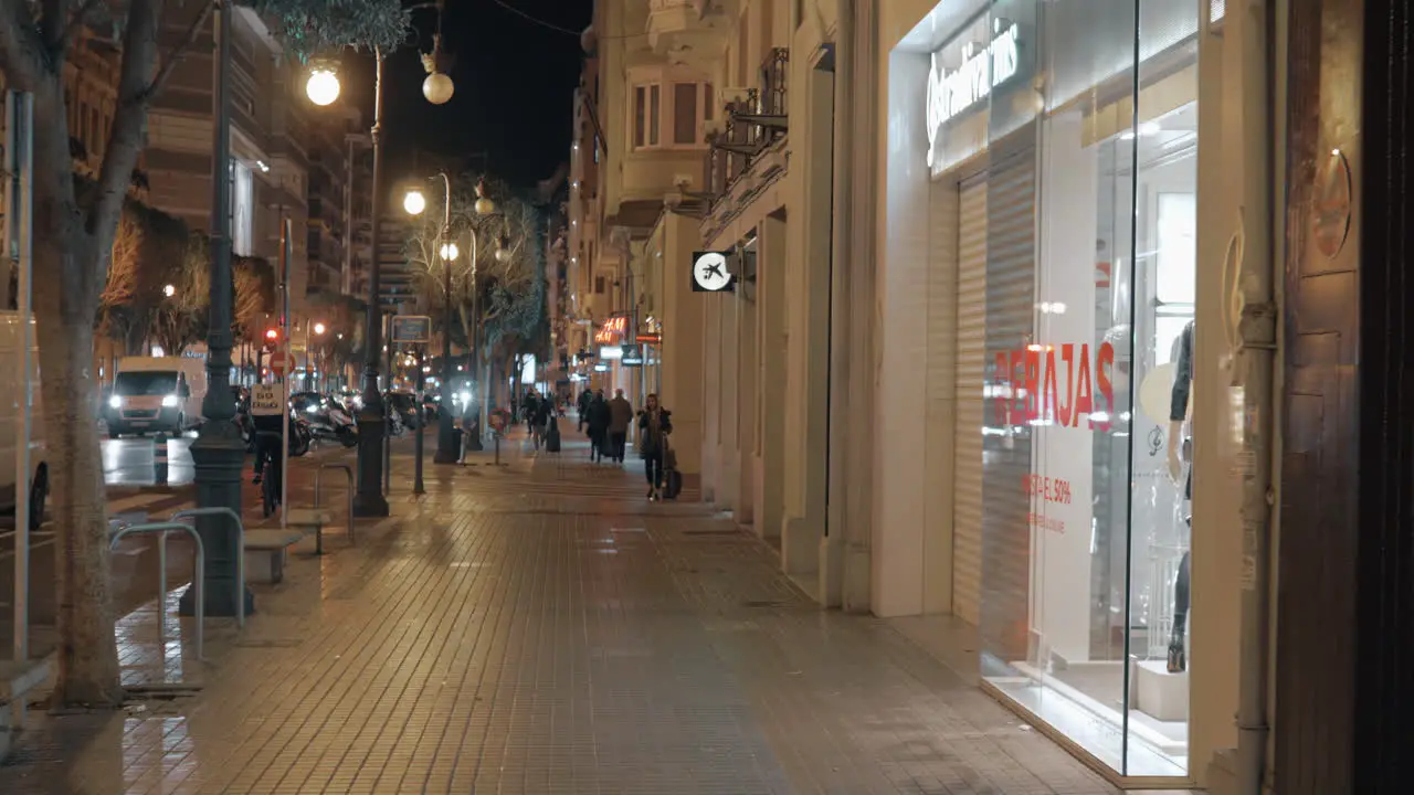 People walking on Carrer de Colon in night Valencia Spain