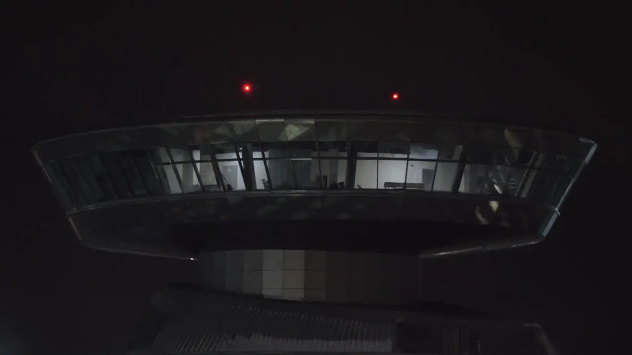 Airport control tower view at night