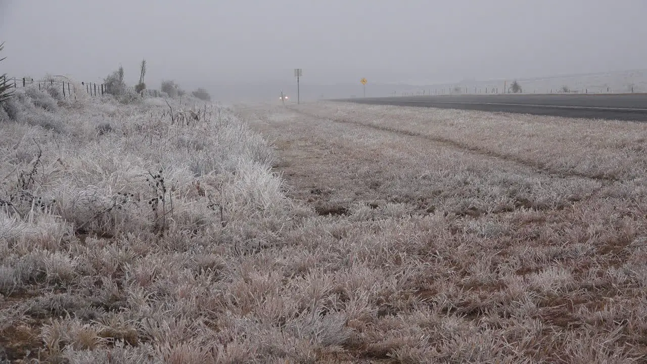 Texas Icy Roadside With Car Driving By