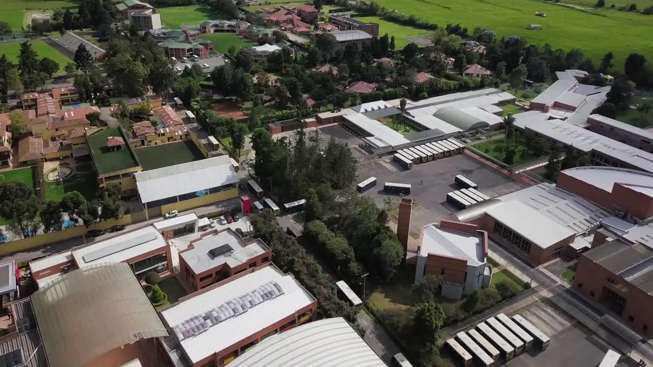 Orbital Drone Shot of full Bus Terminal for City Transportation for daily commuters